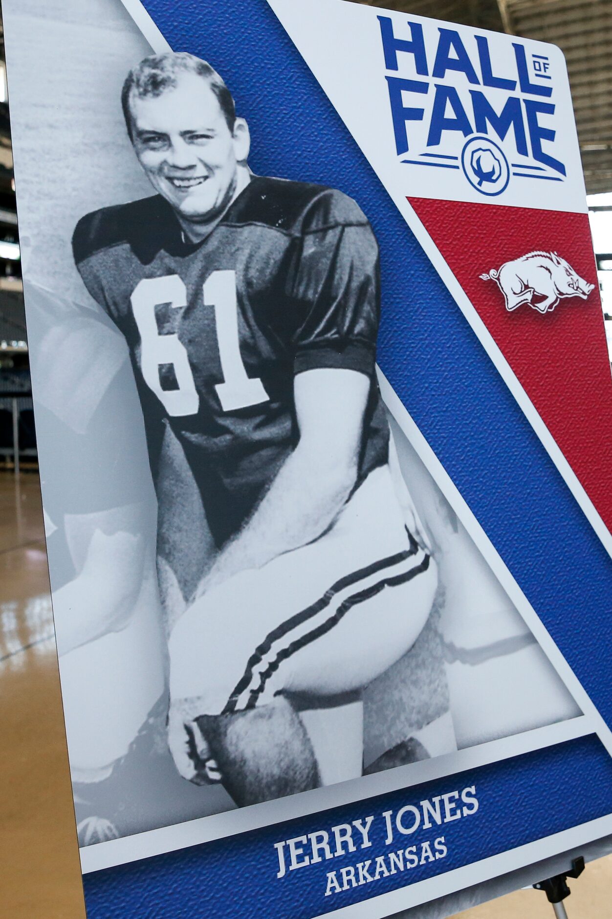 A photo of Dallas Cowboys owner Jerry Jones from his time at the University of Arkansas sits...