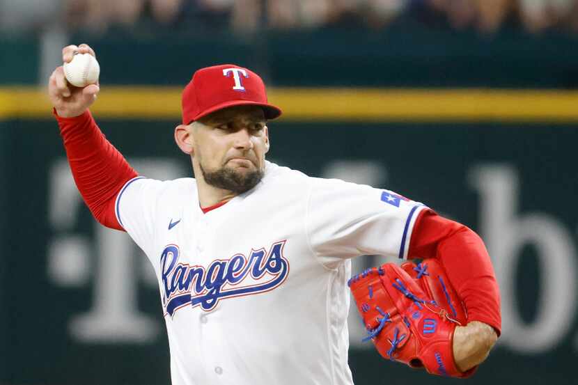 Texas Rangers starting pitcher Nathan Eovaldi throws during the second inning of a baseball...