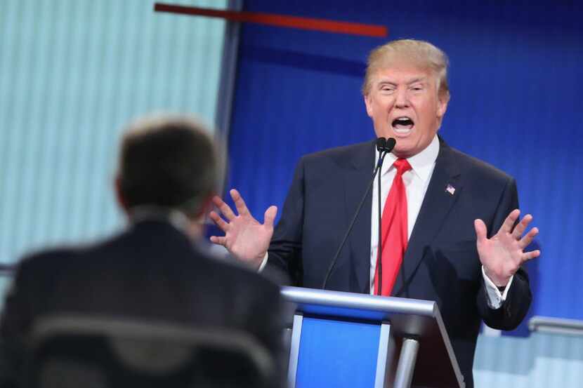  Republican presidential candidate Donald Trump fields a question during the first...