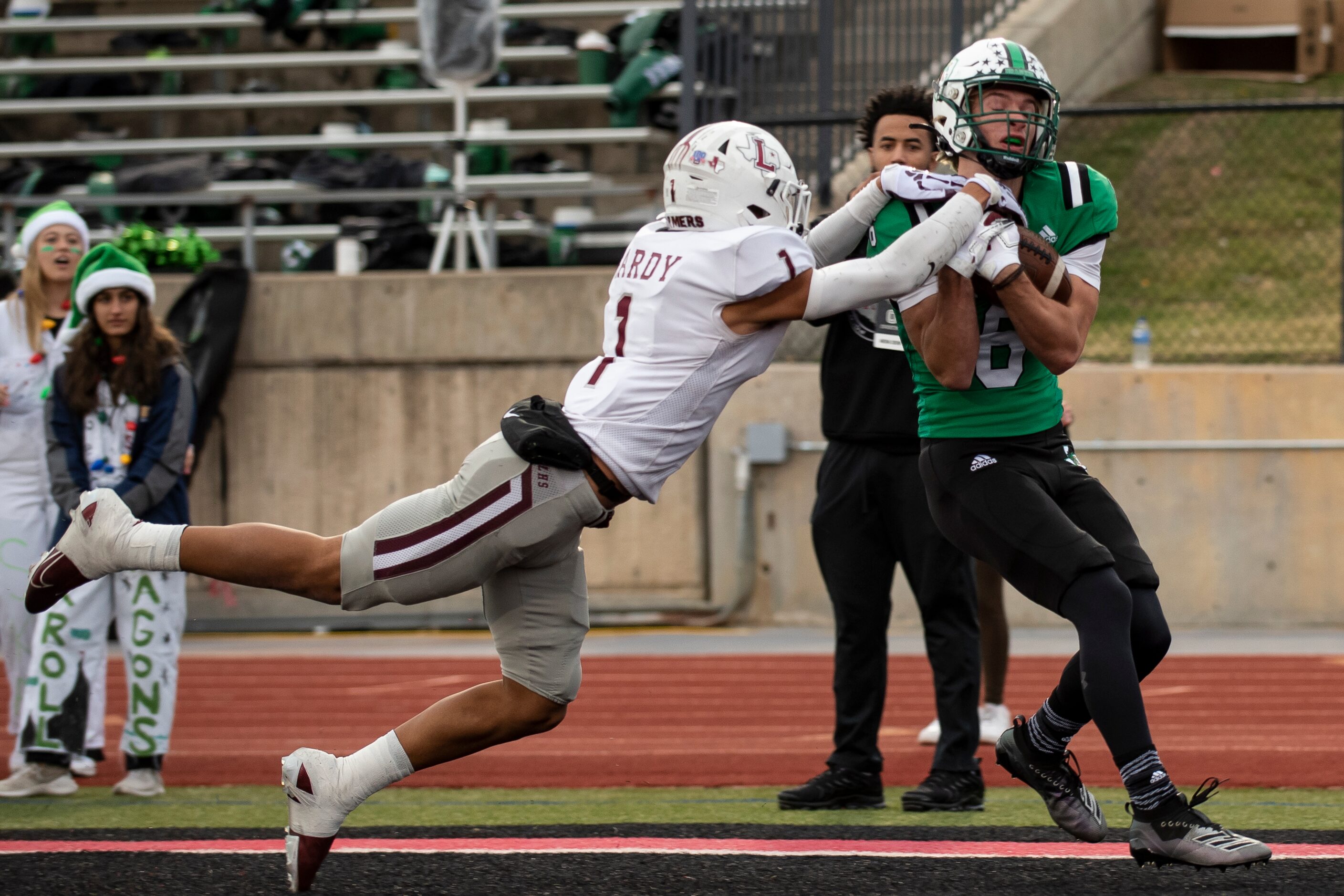 Southlake Carroll senior Landon Samson (6) catches a touchdown pass as Lewisville sophomore...