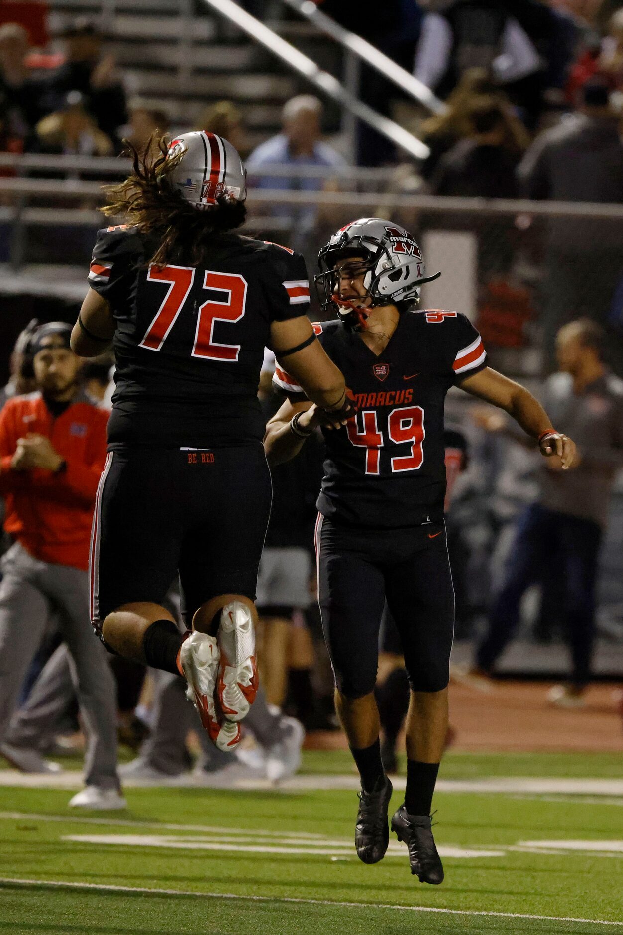 Flower Marcus Marcus kicker Michael Petro (49) celebrates a long field goal agains...