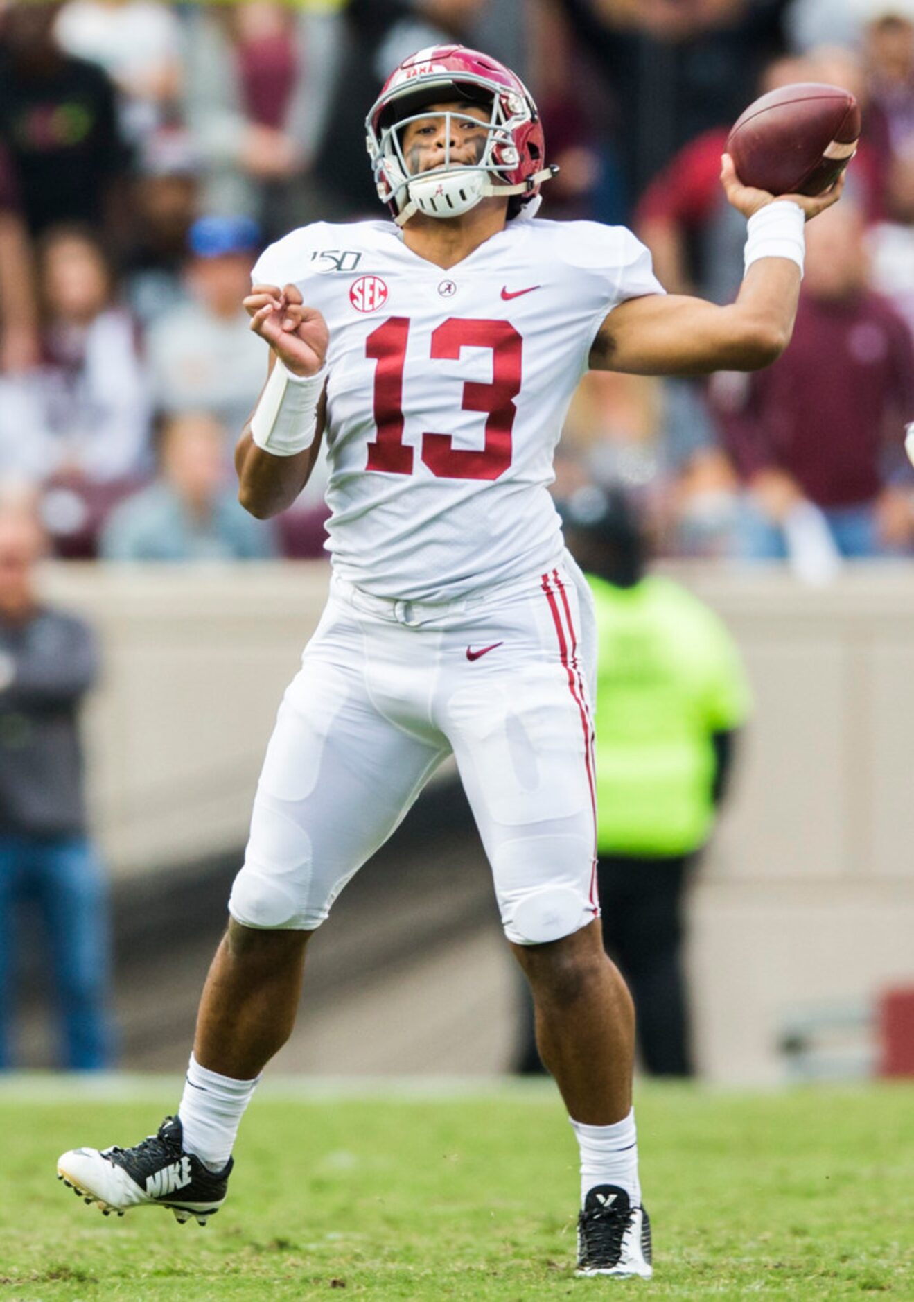 Alabama Crimson Tide quarterback Tua Tagovailoa (13) throws a pass during the third quarter...