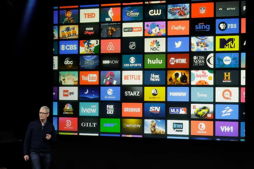 Apple CEO Tim Cook speaks about Apple TV during an announcement of new products Thursday,...