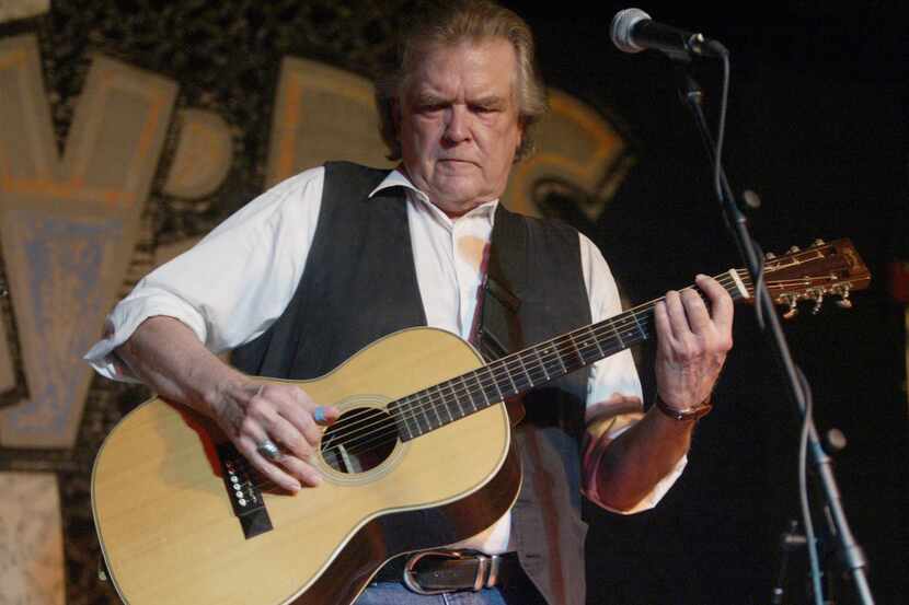 Guy Clark performs at Poor David's Pub during the opening night at the club's new site on...