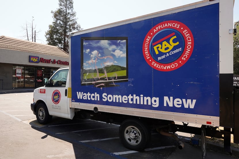 A Rent-A-Center delivery truck is seen in Sacramento, Calif., on Aug. 2. California Attorney...