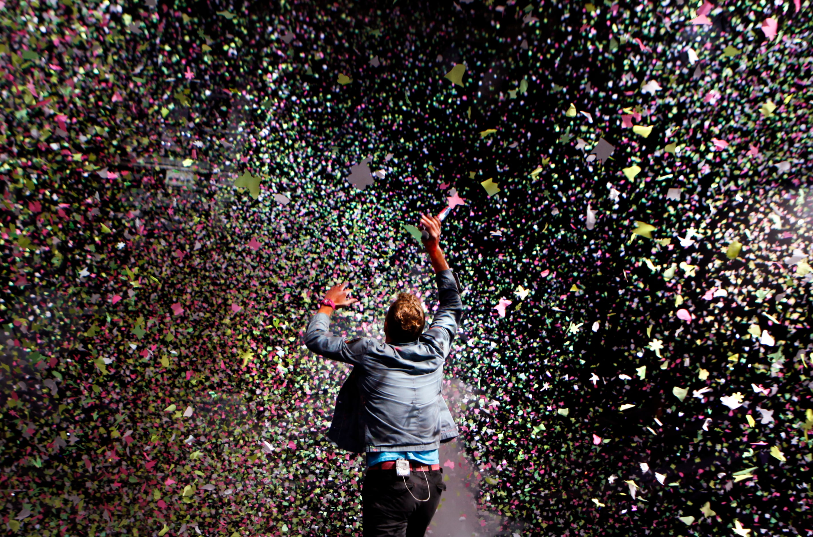 Confetti rained down on Coldplay's Chris Martin during the band's show June 22 at American...