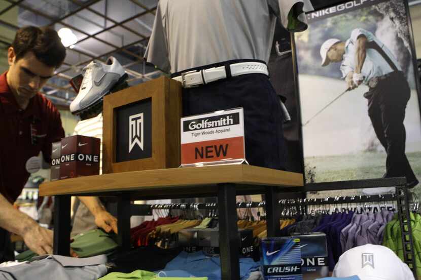 Golfsmith stores featured a prominent Tiger Woods apparel sections in 2010. (AP Photo/Frank...