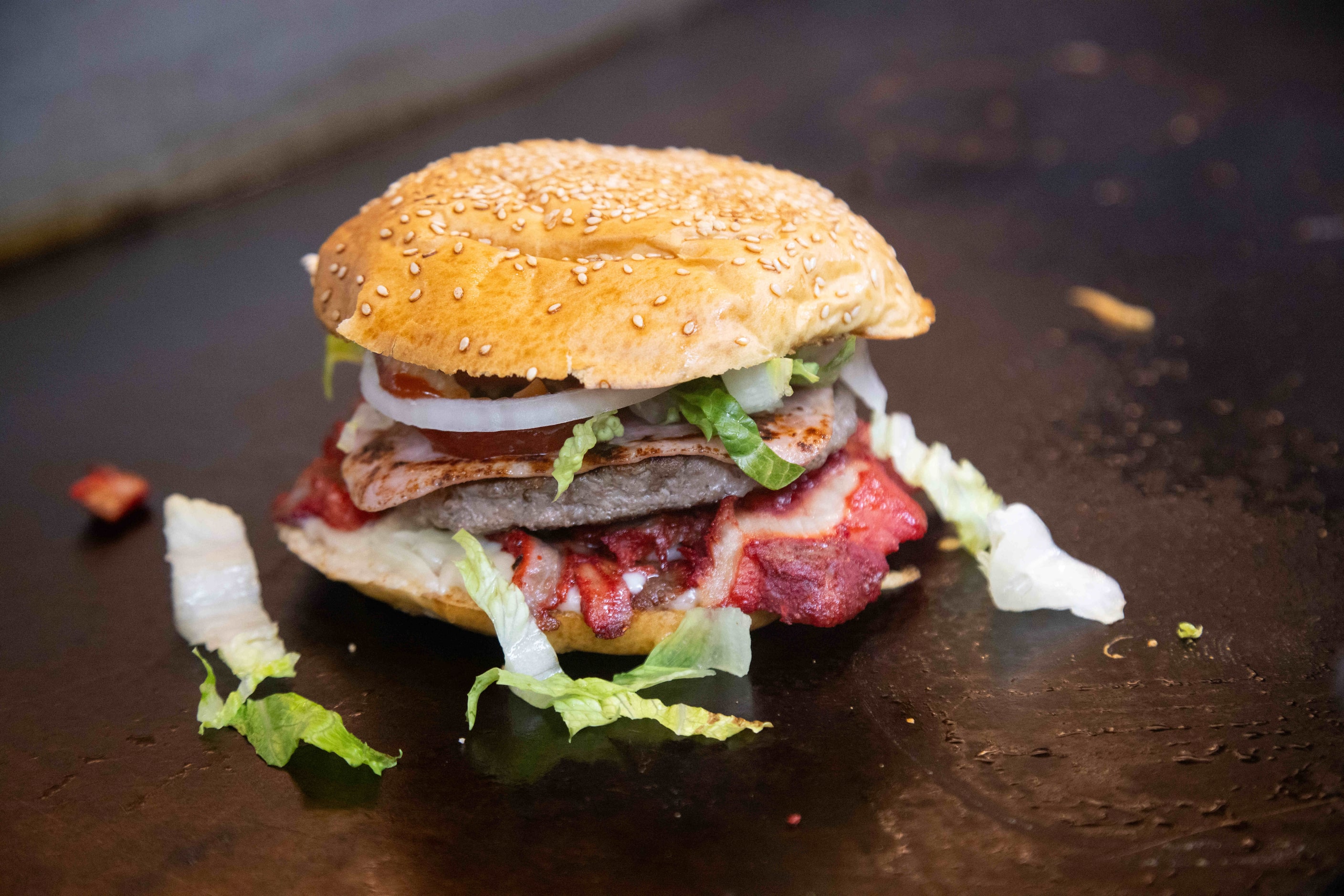 Trompo isn't just for tacos. Here's a look at a trompo burger at Taco Rey (Polkmart).