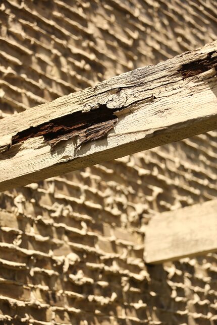 This wooden beam outside Robin Bobo's old apartment was part of the reason he had to move. 