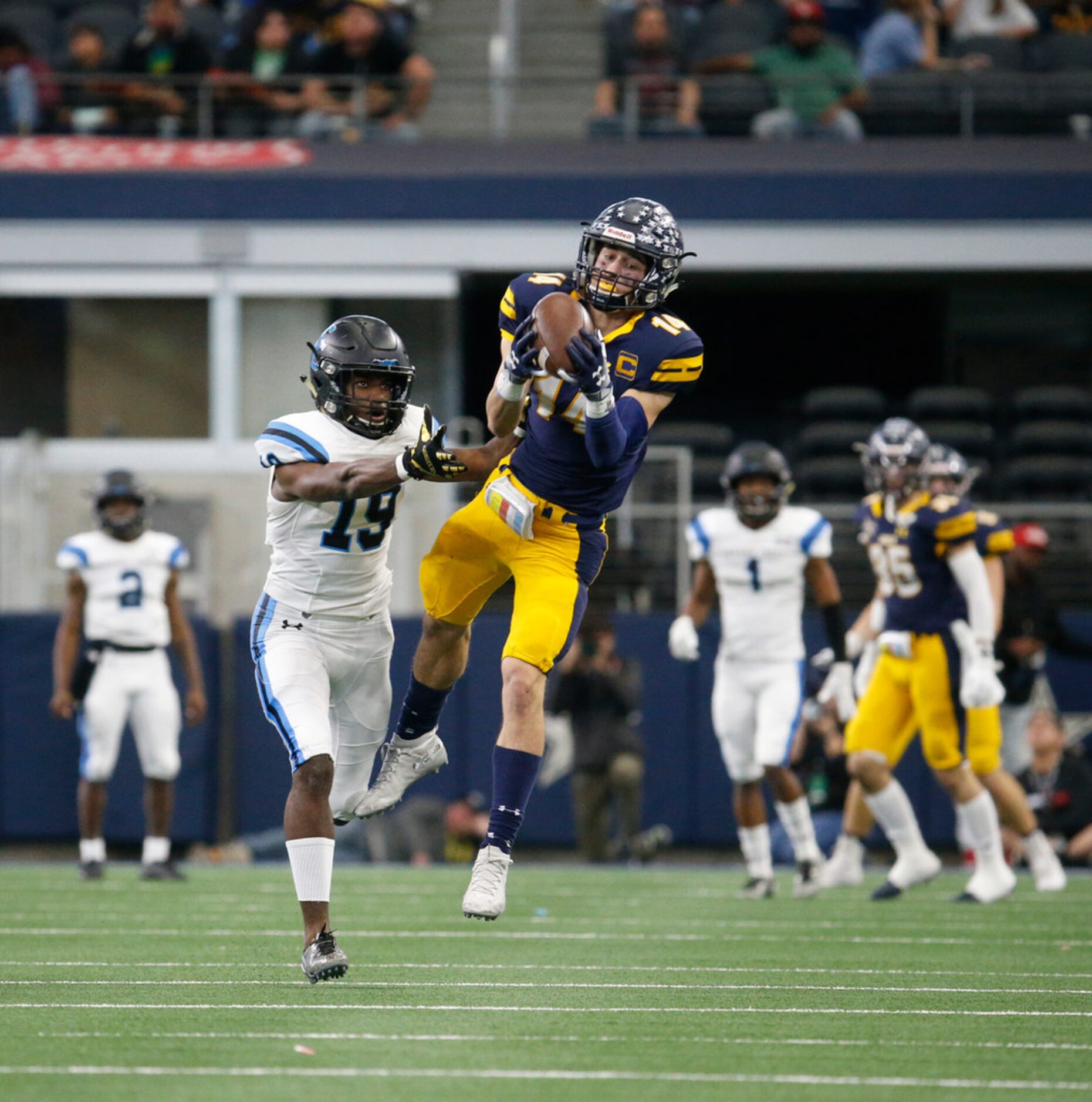 Highland Park's  Hudson Clark (14) intercepts the ball against Shadow Creek's Carlton Guidry...