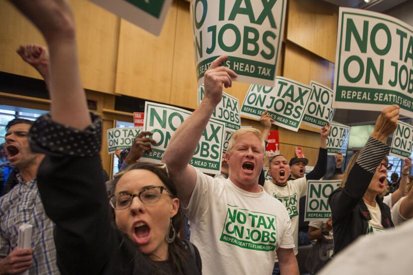 The vote to kill the $275 per-employee tax represents a victory for Amazon and the other big...