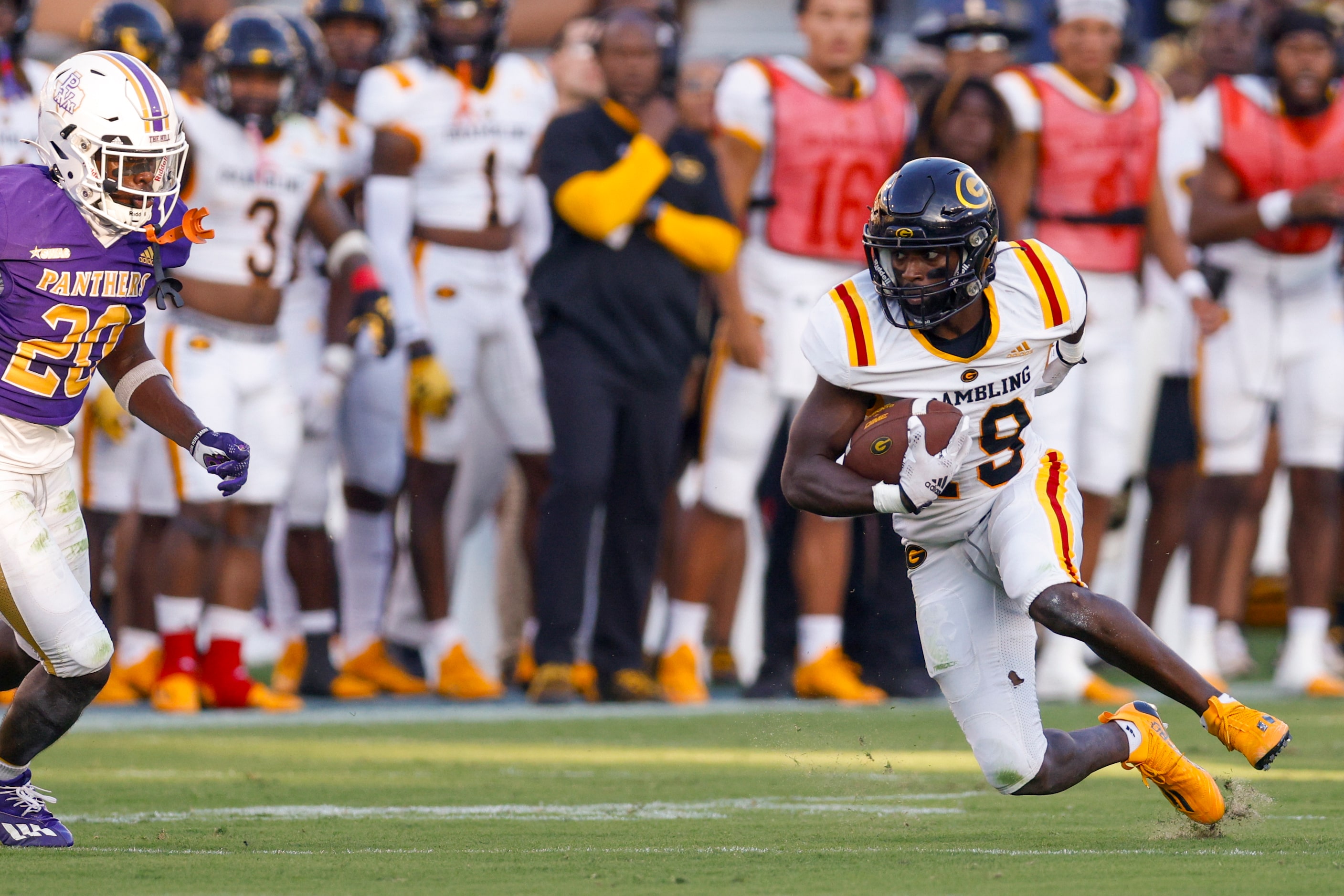 Grambling State wide receiver Antonio Jones (19) turns up field ahead of Prairie View A&M...