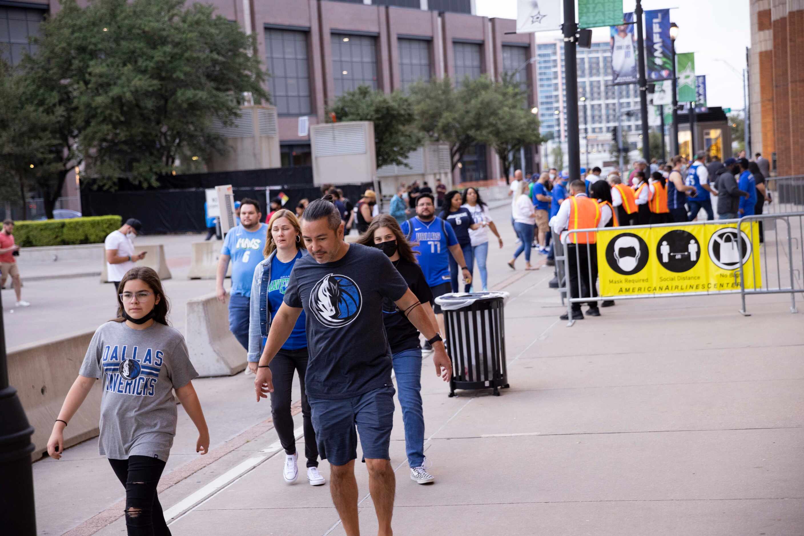 People outside the stadium before the Dallas Mavericks home opener against the Houston...
