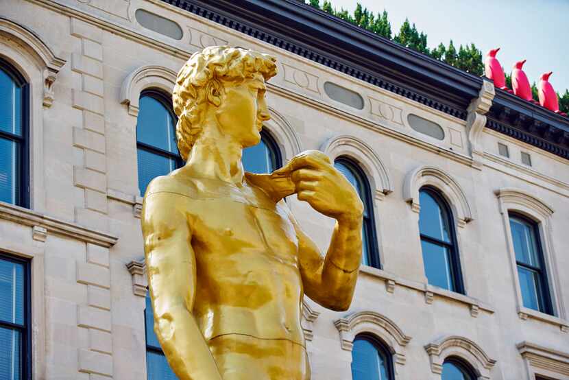 Conceptual artist Serkan Özkaya made his double-size golden replica of Michelangelo's David...