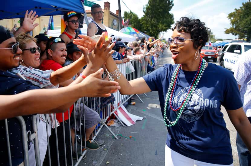 New Dallas Police Chief U. Renee Hall greeted the crowd as she walked the length of the...