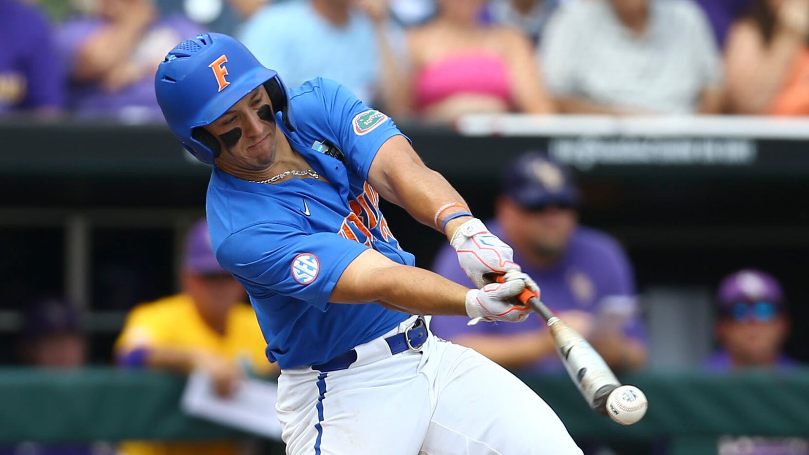 Florida's Wyatt Langford singles during the fourth inning of Game 2 of the NCAA College...