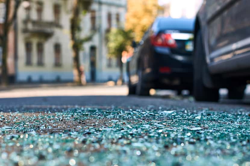 Car crash with glass on concrete