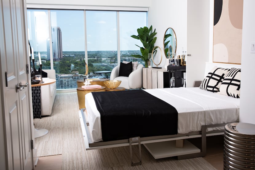 A pull-down bed in one of the studio units in the One Uptown condo tower on McKinney Avenue...