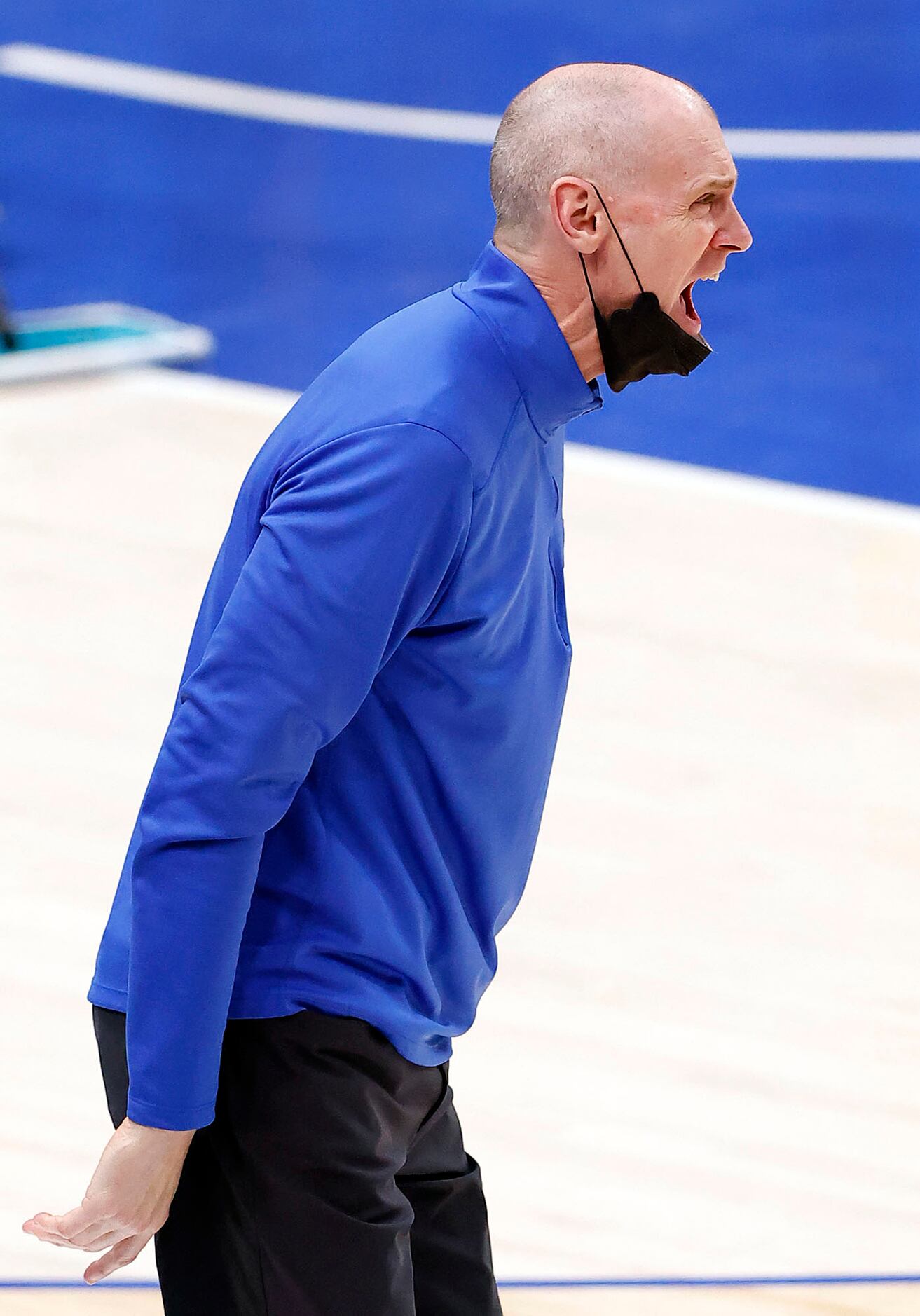 Dallas Mavericks head coach Rick Carlisle screams instruction to his players in the third...