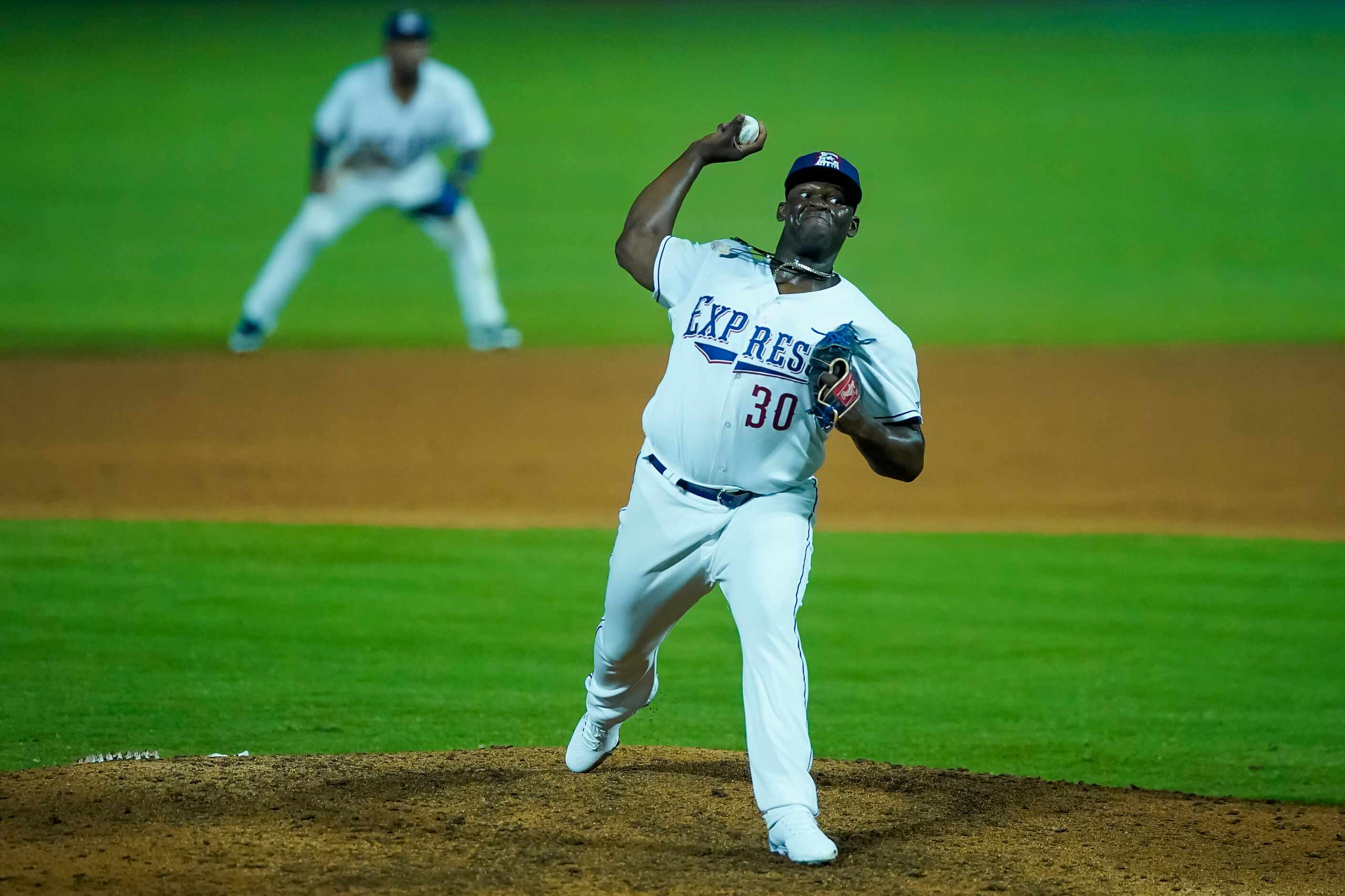 Round Rock Express pitcher Demarcus Evans delivers during the ninth inning against the...