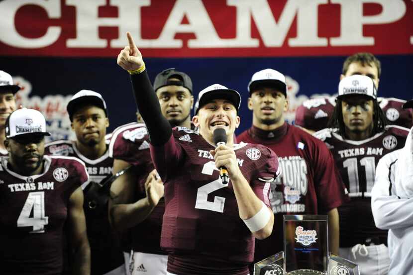 Texas A&M Aggies quarterback Johnny Manziel (2) speaks to fans after the game against Duke...