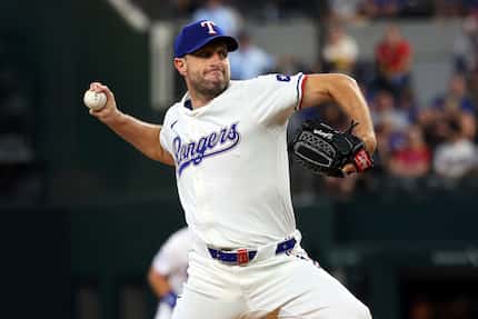 Texas Rangers starting pitcher Max Scherzer delivered in the first inning of a baseball game...