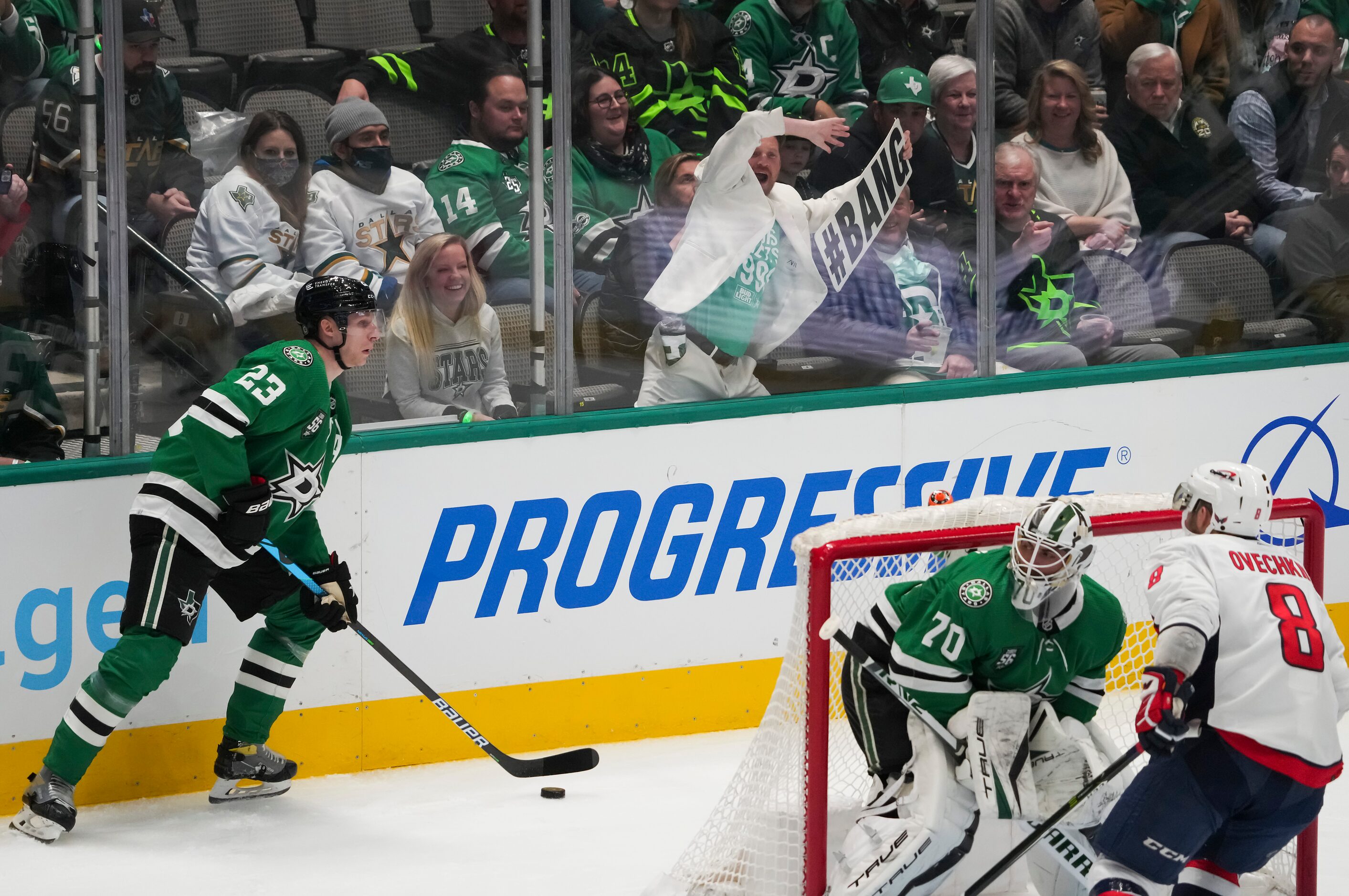 A fan tries to distract Washington Capitals left wing Alex Ovechkin (8) as Dallas Stars...