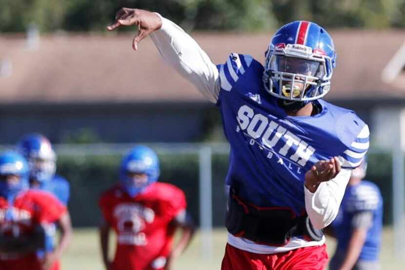 Jaquarion "JT," Turner attempts a pass in practice at South Garland High School in Garland,...