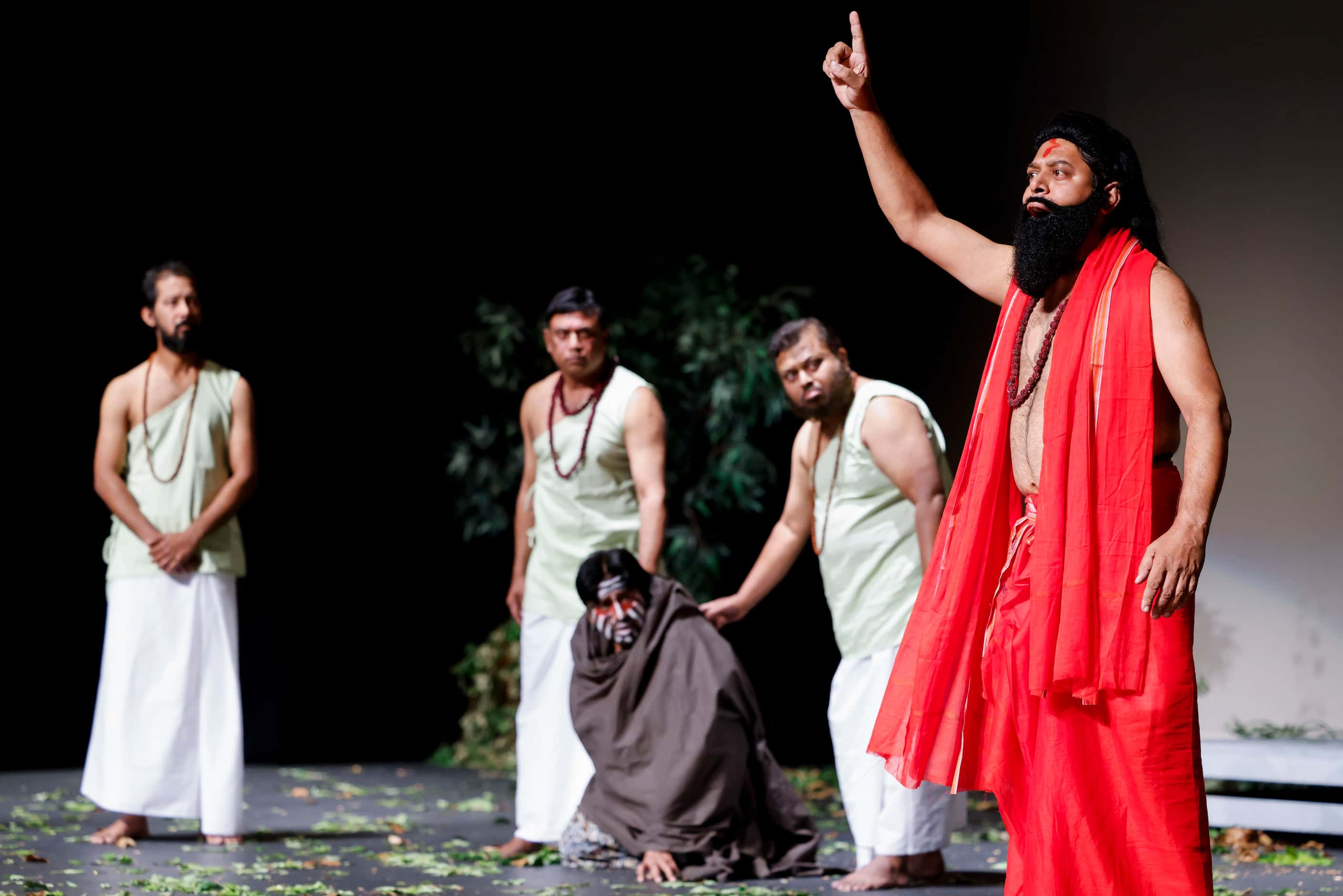 Kausik Roy (right) acts on his role for Bishwamitra , in the play Shakuntala, on Friday,...