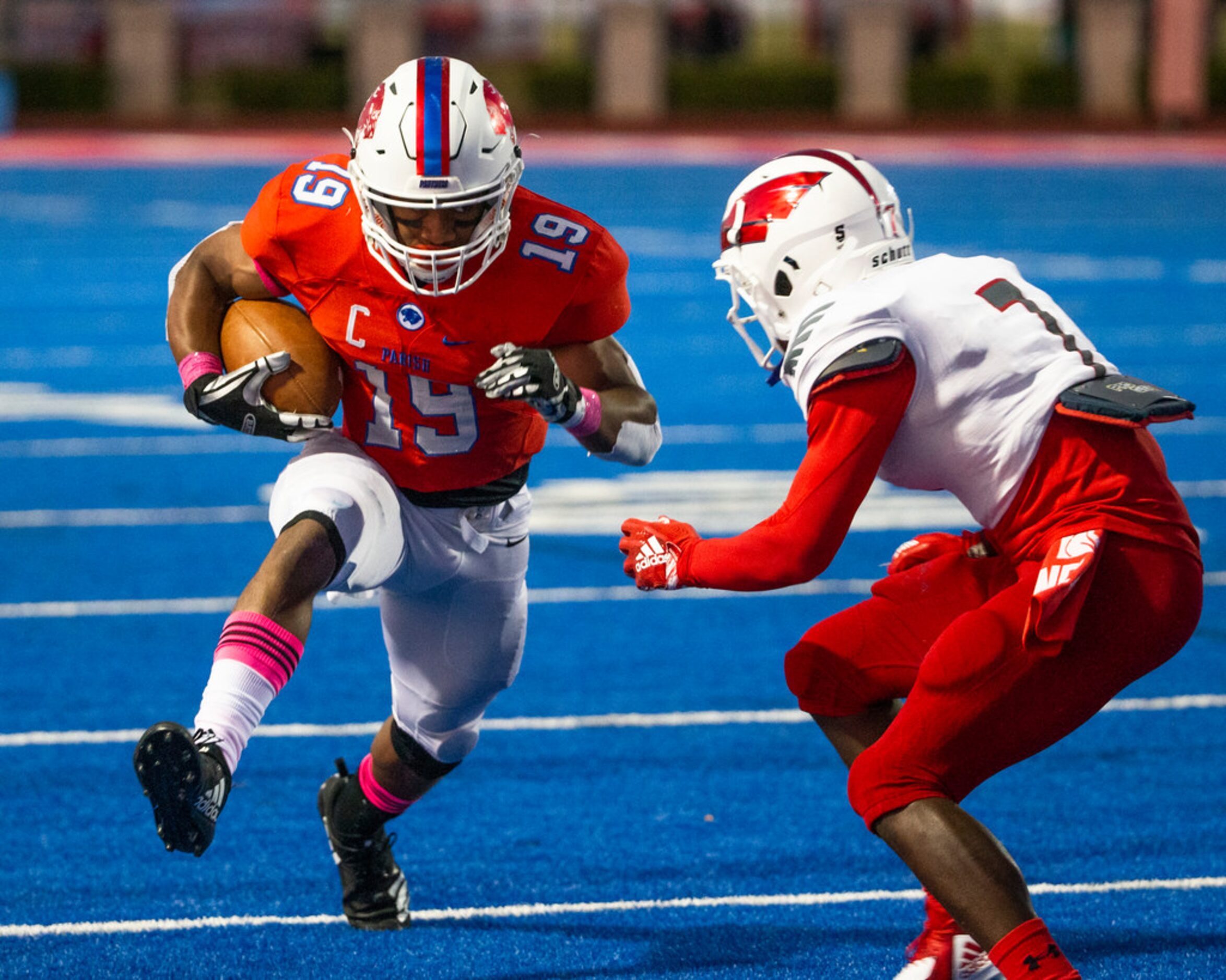 Parish Episcopal wide receiver Kaleb Culp (19) rushes for yards against Bishop Dunne...