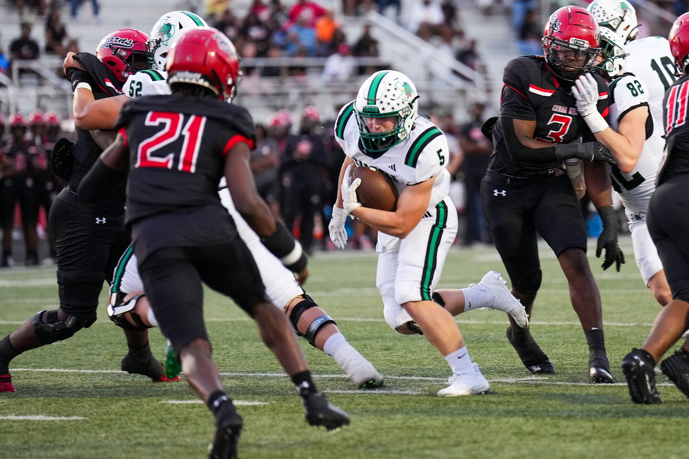 Southlake Carroll running back James Lehman (5) scores on a 5-yard touchdown run as Cedar...