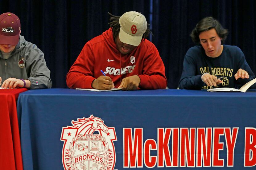 L to R, McKinney Boyd football players Cameron Darling and Tyrese Robinson and soccer player...