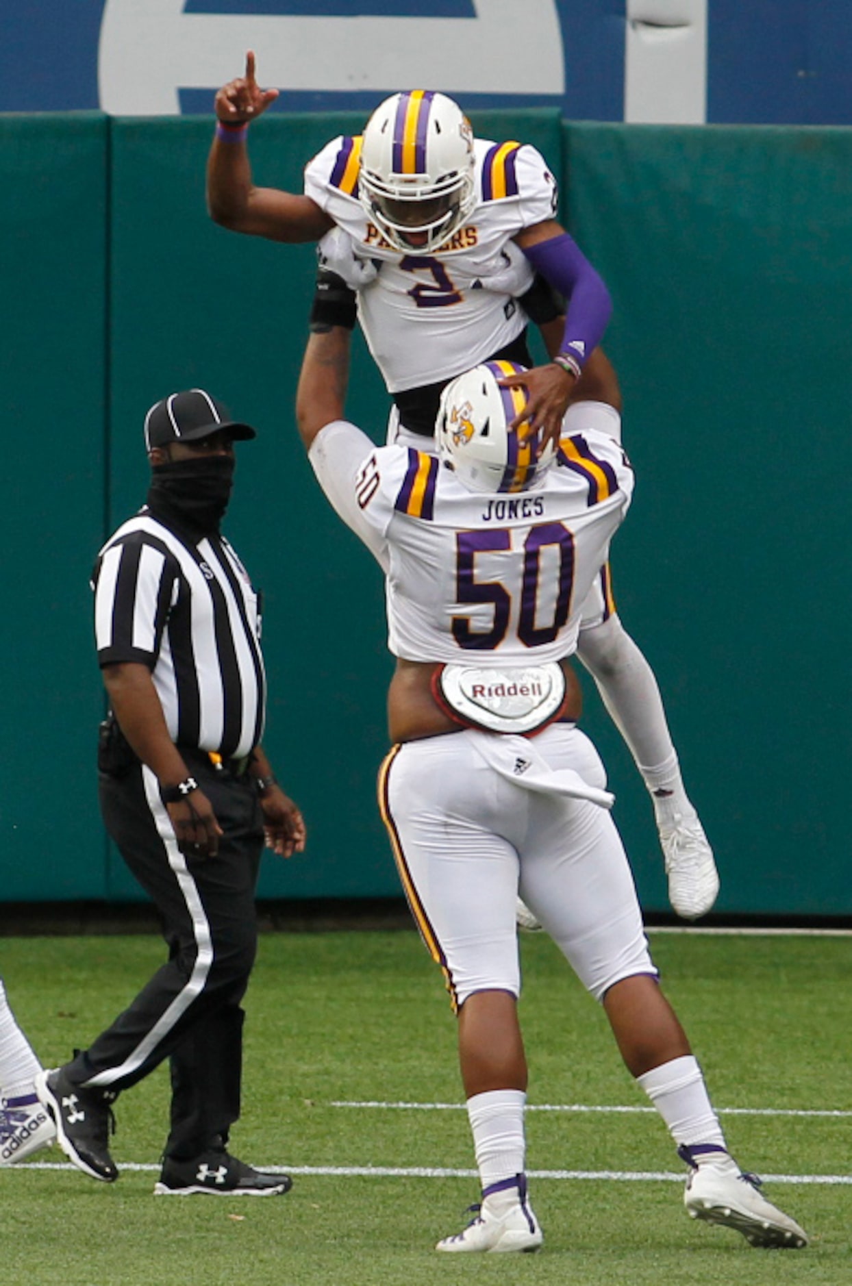 Prairie View A&M quarterback Tyriek Starks (2) celebrates his rushing touchdown as teammate...