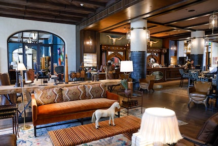 Bowie House in Fort Worth has a sprawling lobby with an upscale ranch look. This hotel feels...