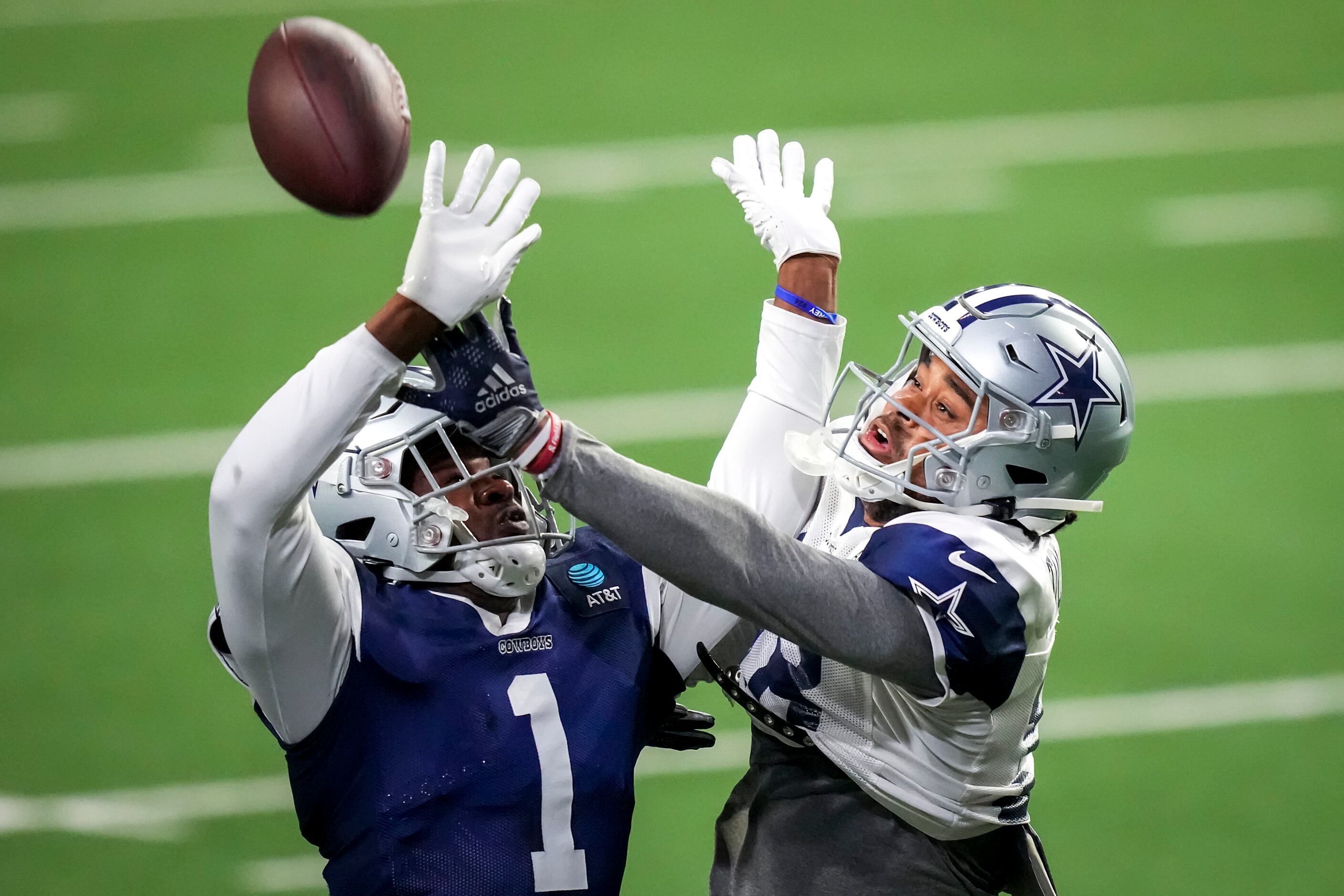 Dallas Cowboys cornerback Isaac Taylor-Stuart runs with the ball