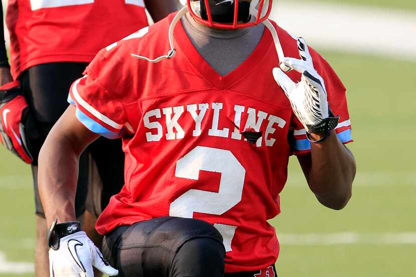 Skyline defender Cedric Collins (2) goes through a drill before the team's spring football...