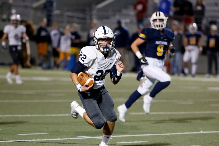 Fort Worth All Saints running back Jacob Matlock (22) runs for a touchdown in a TAPPS...