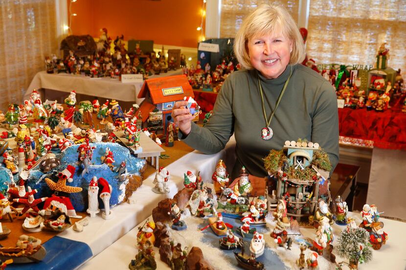 Janny Strickland inherited her mother's Santa figurine collection. Strickland is displaying...