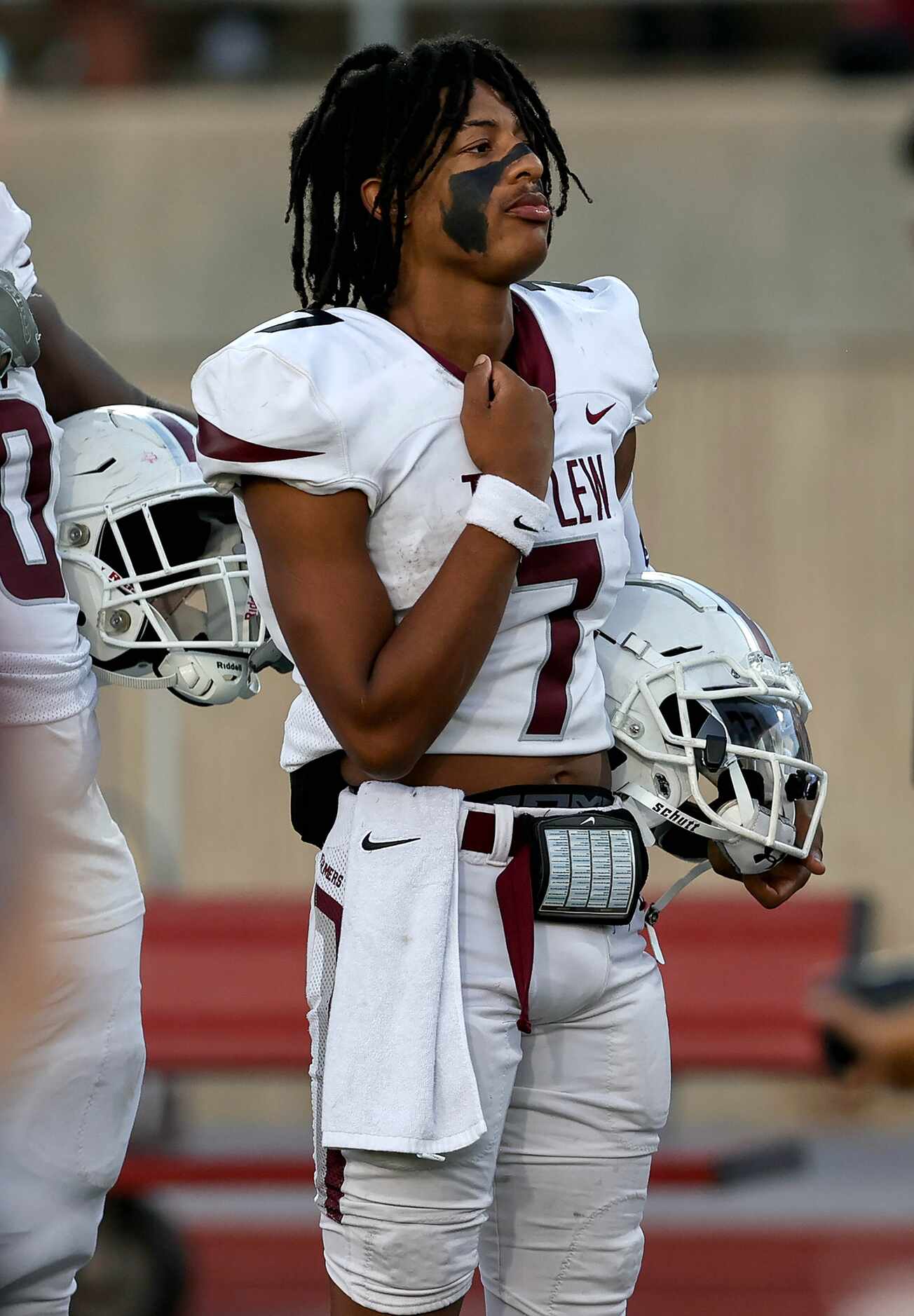 Lewisville quarterback Ethan Terrell stands on the sideline during the National anthem...
