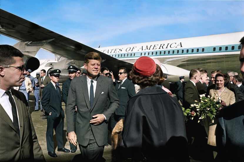 In this colorized photo Secret Service agent Paul Landis (far left) stands near President...