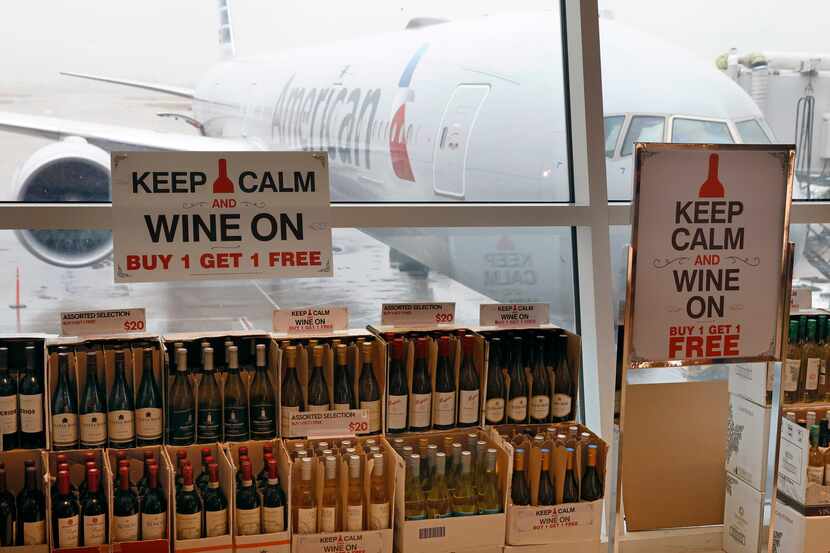 Boxes of wine are Buy One, Get One Free at TRG Duty Free shop in Terminal D at DFW Airport...