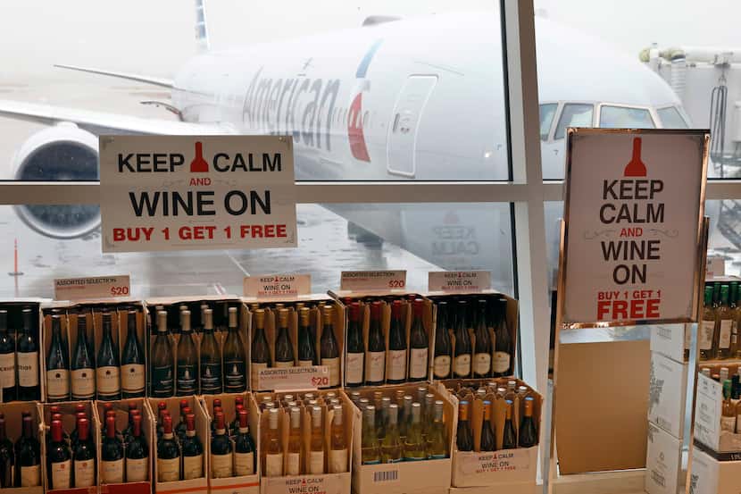 Boxes of wine are Buy One, Get One Free at TRG Duty Free shop in Terminal D at DFW Airport...