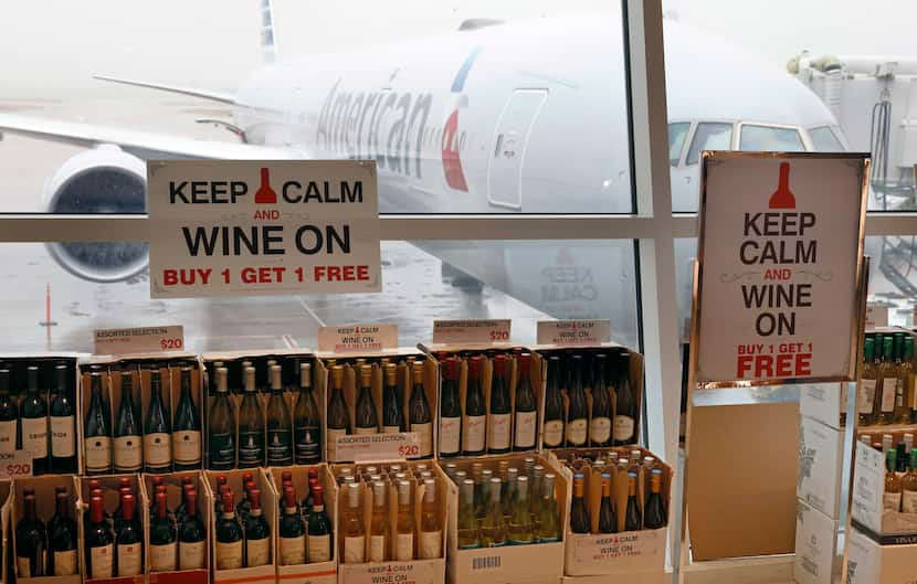 Boxes of wine are buy one, get one free at the TRG Duty Free shop in Terminal D.