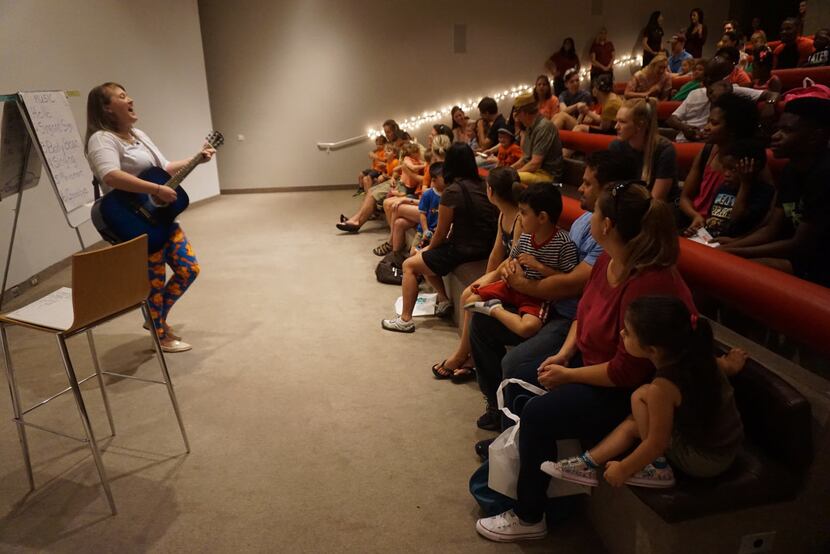 A music therapist leads families through songs about the Dallas Museum of Art's works at one...