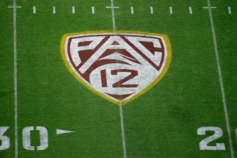 FILE - The Pac-12 logo is shown at Sun Devil Stadium during the second half of an NCAA...