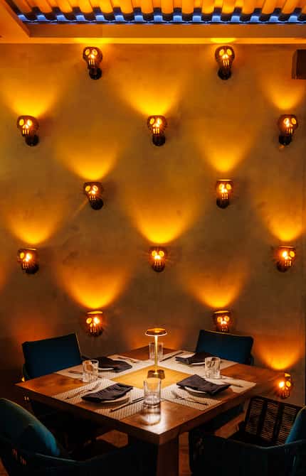 The skulls that light up the wall at The Mexican in Dallas are some of designer Paulina...