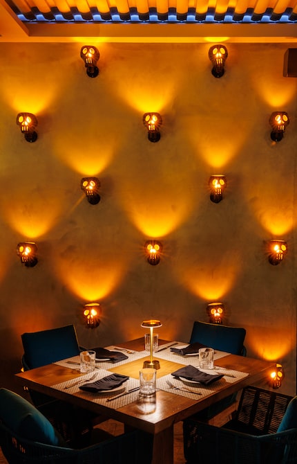 The skulls that light up the wall at The Mexican in Dallas are some of designer Paulina...