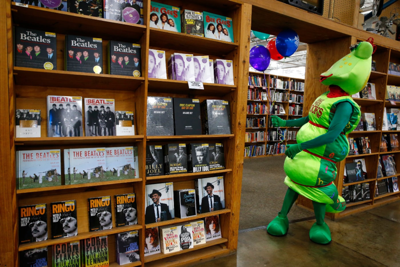 Bookworm gets balloons stuck on one of the shelves of Half Price Books during the 45th...