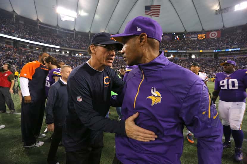 MINNEAPOLIS, MN - DECEMBER 1:  Head coach Leslie Frazier of the Minnesota Vikings and head...
