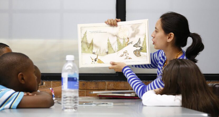 “It’s a lot more fun for me if I’m teaching something,” said Corinne Gonzalez, who reads to...